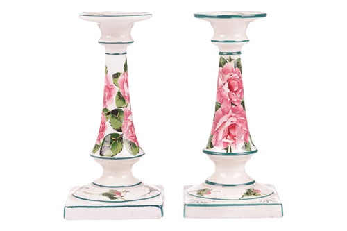 Lot 69 - A pair of Wemyss pottery candlesticks, early...