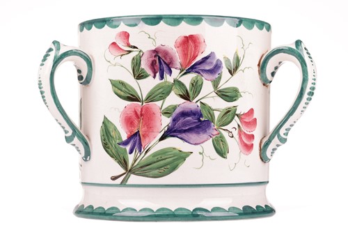 Lot 148 - A large Wemyss pottery tyg, with sweetpea...