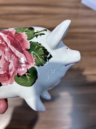 Lot 73 - A pair of Wemyss pigs, with cabbage rose...