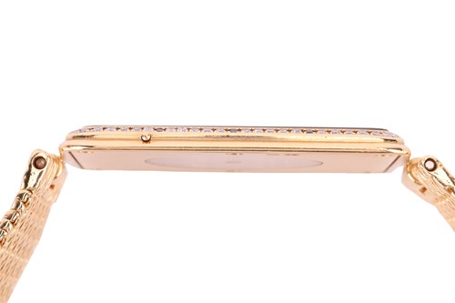 Lot 203 - An Omega La Magique "The Phantom" 18ct gold...