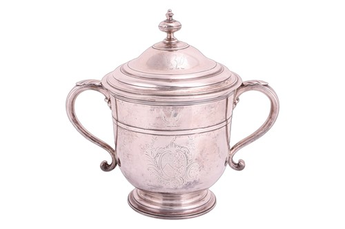 Lot 242 - A Queen Anne silver two handled cup and cover...