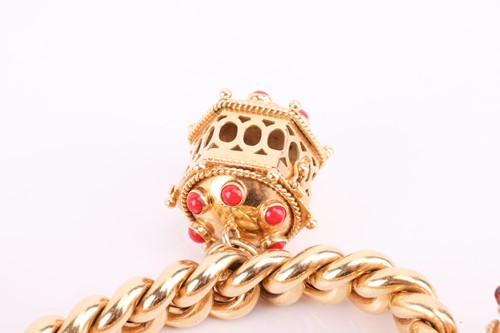 Lot 105 - Carl Bucherer - an Etruscan revival charm...