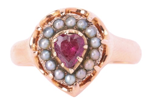 Lot 121 - A garnet and seed pearl dress ring, featuring...