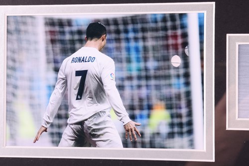 Lot 109 - Cristiano Ronaldo: a hand-signed Real Madrid...