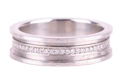 Lot 95 - A diamond-set platinum band, the 6mm ridged...