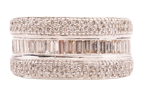 Lot 158 - A diamond-set saddle ring, the central panel...