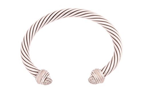 Lot 106 - A diamond-set torque bangle by David Yurman,...