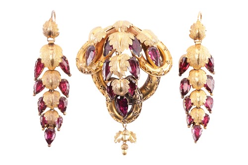Lot 4 - A Victorian garnet suite, comprising earrings...