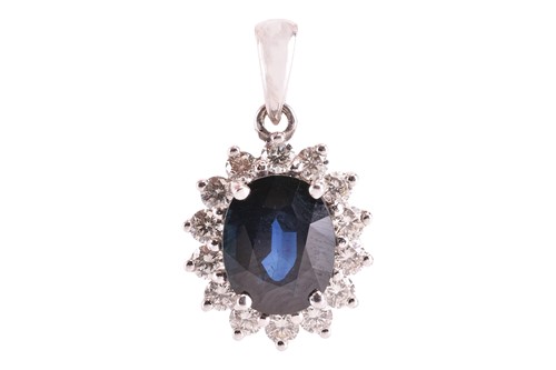 Lot 70 - A sapphire and diamond cluster pendant,...