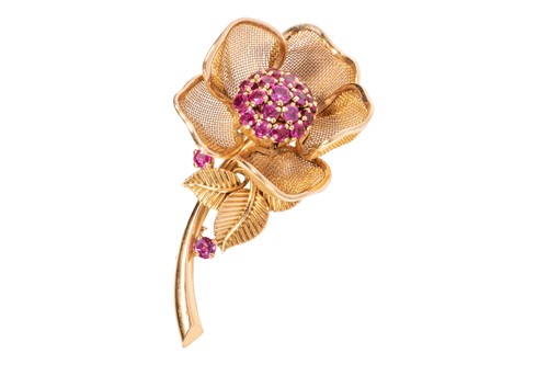 Lot 1 - A ruby flower brooch, French circa 1950s, by...