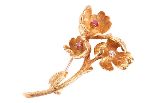 Lot 1 - A diamond and ruby floral spray brooch, circa...