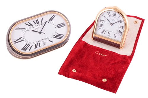 Lot 205 - Cartier. A gilt brass and enamel alarm clock;...