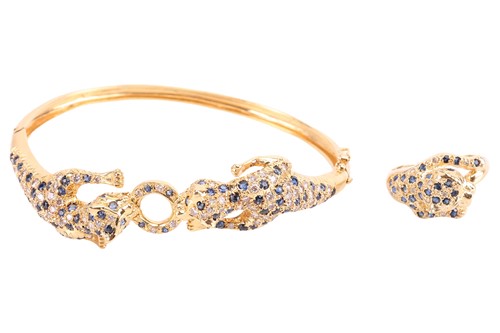 Lot 65 - A sapphire and diamond panther bracelet, with...