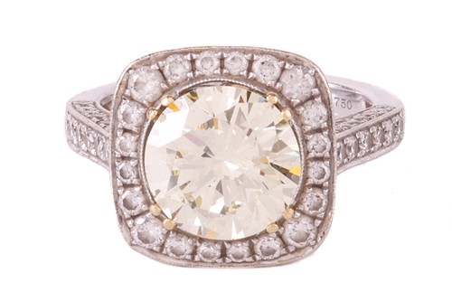 Lot 145 - A diamond cluster ring, featuring a...