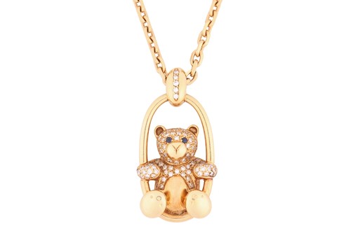 Lot 140 - A gem-set teddy bear pendant on chain,...