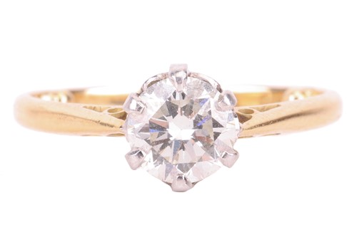 Lot 113 - A diamond solitaire ring, claw-set with a...