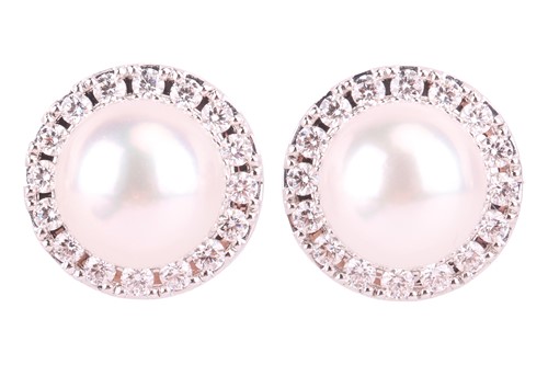Lot 92 - A pair of pearl and diamond halo earrings by...