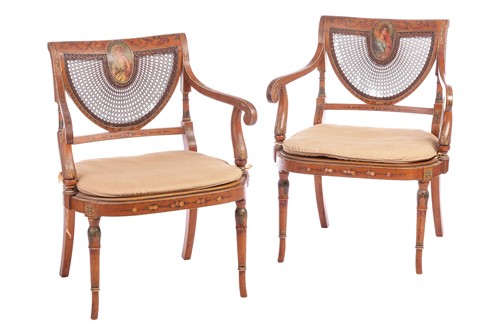 Lot 141 - A pair of Regency-style painted satinwood open...