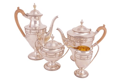 Lot 209 - Asprey & Co. - a silver four-piece tea service,...