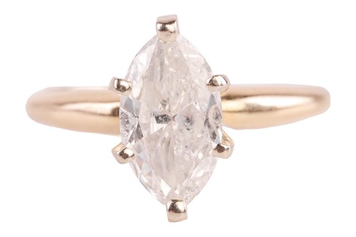 Lot 143 - A marquise-cut diamond solitaire ring, the...