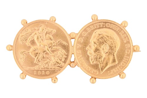 Lot 52 - A double half-sovereign brooch, comprising the...