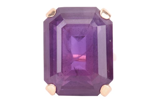 Lot 45 - A large amethyst cocktail ring, comprising a...