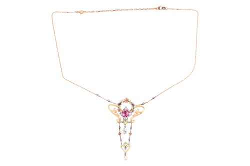 Lot 99 - An Art Nouveau gem-set floral lavaliere...
