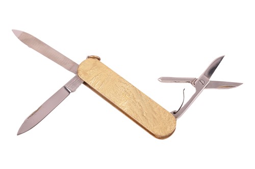 Lot 183 - A samorodok-style lighter and pen knife by...