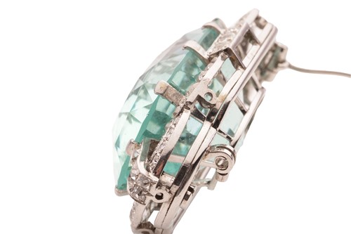 Lot 129 - An Art Deco aquamarine and diamond brooch,...