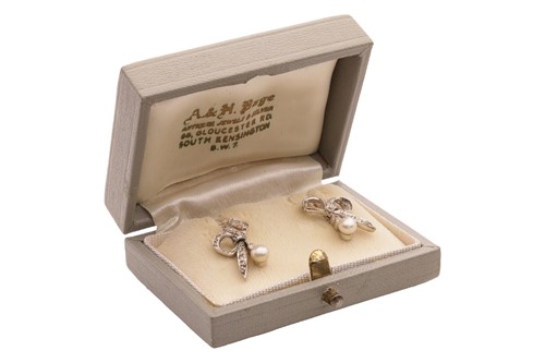 Lot 11 - A pair of pearl and diamond earrings, each...