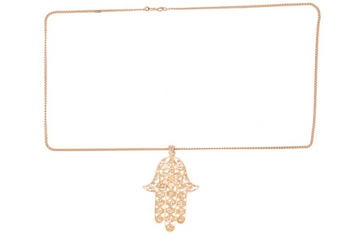 Lot 103 - A filigree Hamsa pendant on chain, composed of...