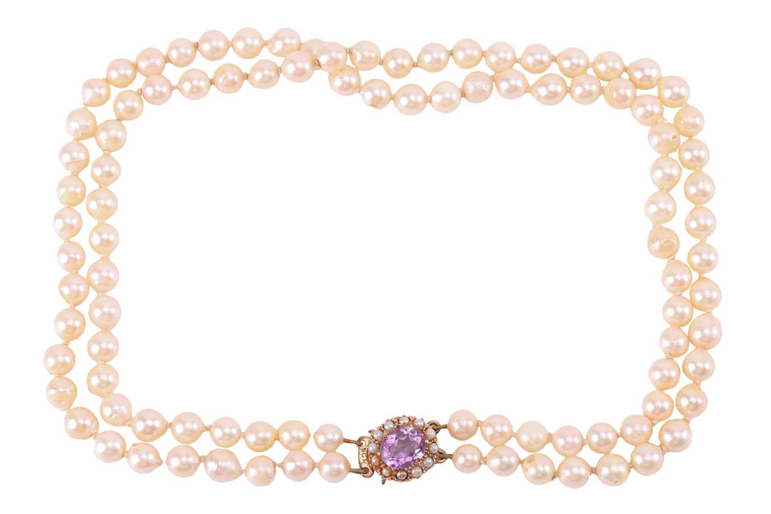 Lot 106 - A double-strand cultured pearl necklace; the...