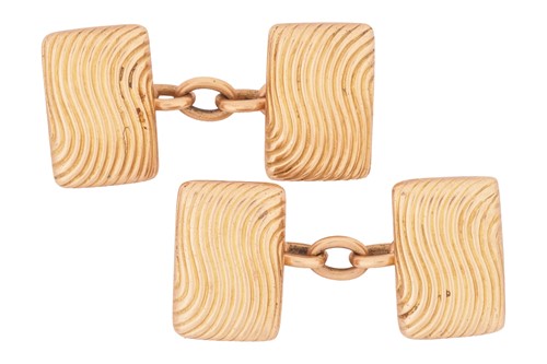 Lot 10 - A pair of cufflinks, of rectangular form, wavy...