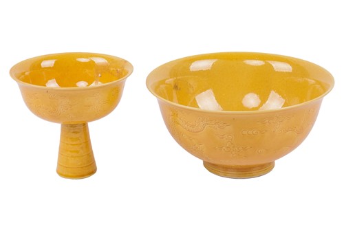 Lot 74 - A Chinese Yellow glazed porcelain stem cup,...