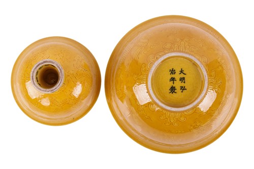 Lot 74 - A Chinese Yellow glazed porcelain stem cup,...