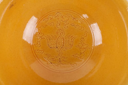Lot 74 - A Chinese Yellow glazed porcelain stem cup,...