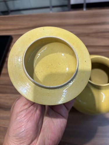 Lot 135 - A pair of Chinese Imperial Yellow porcelain...