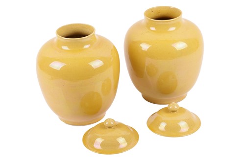 Lot 135 - A pair of Chinese Imperial Yellow porcelain...