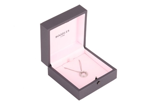 Lot 63 - Boodles - a 'Roulette' medium necklace set in...