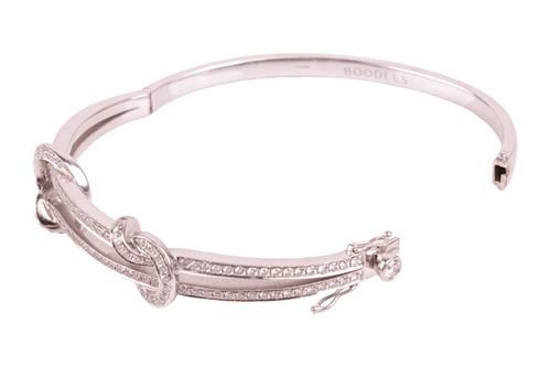 Lot 78 - Boodles - a 'Knot' diamond-set hinged bangle,...