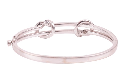 Lot 78 - Boodles - a 'Knot' diamond-set hinged bangle,...