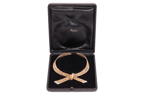 Lot 171 - Kutchinsky - a diamond-set bow necklace, set...