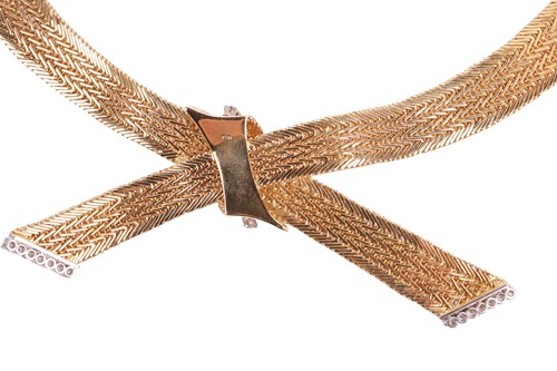 Lot 171 - Kutchinsky - a diamond-set bow necklace, set...