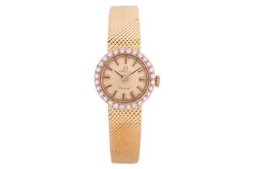 Lot 239 - An Omega 18 Carat Diamond Set Cocktail Watch...