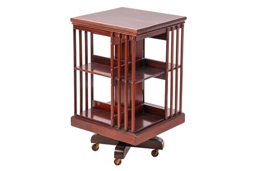 Lot 108 - An Edwardian Maple & Co mahogany revolving...