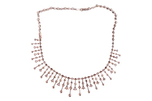 Lot 238 - An Edwardian diamond and pearl fringe necklace,...