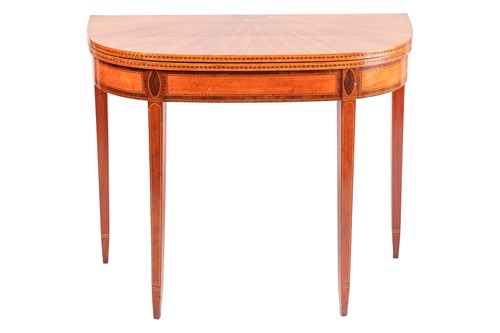 Lot 102 - A George III satinwood and parquet line inlaid...