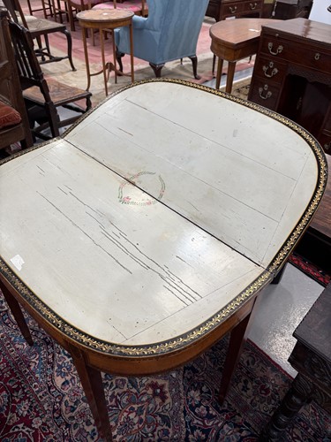 Lot 102 - A George III satinwood and parquet line inlaid...