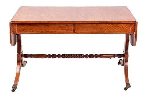 Lot 78 - A Regency mahogany two-flap sofa table with...