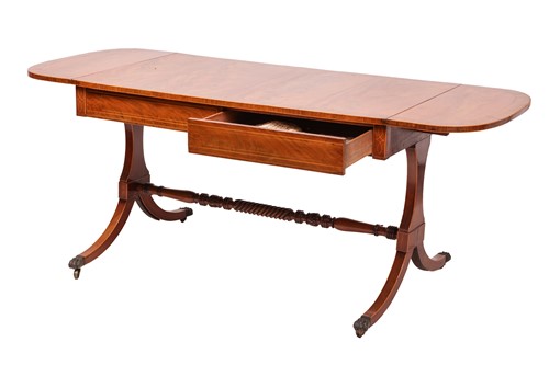 Lot 78 - A Regency mahogany two-flap sofa table with...